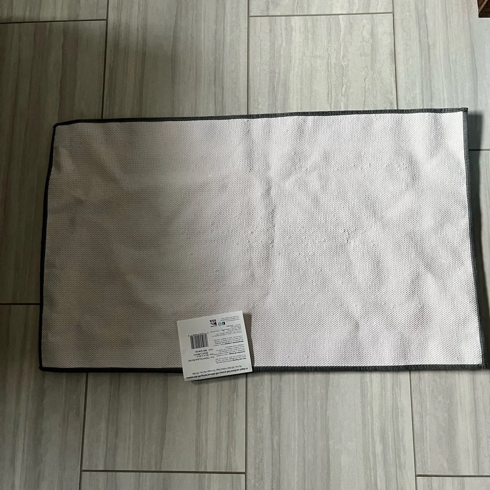 New bath rug with tags